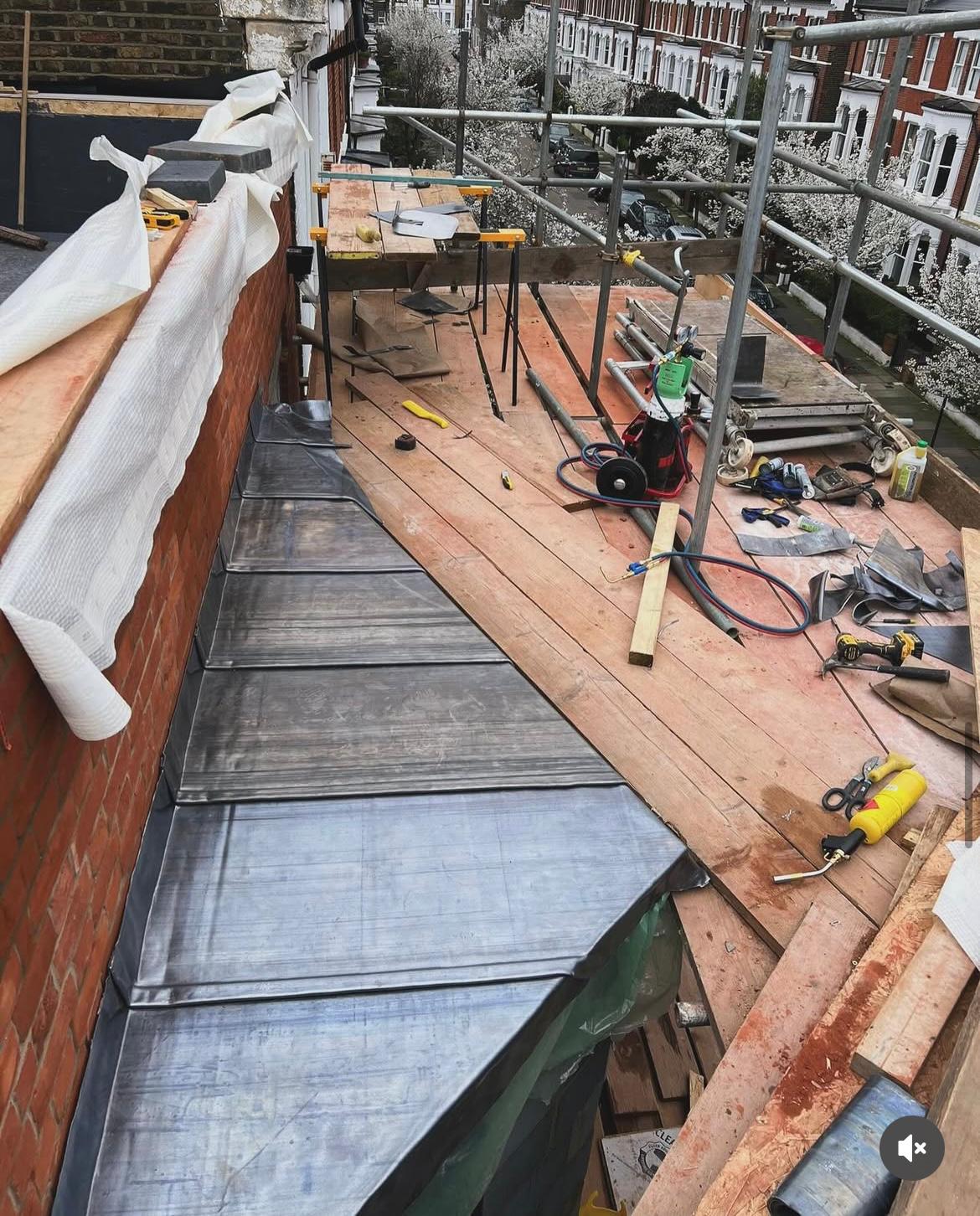View of flat roof under repair.